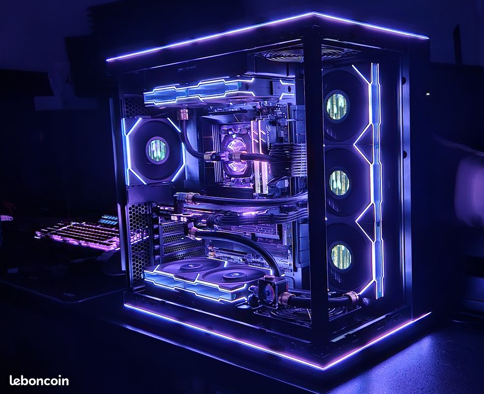 Customizable gamer PC setup with vibrant neon lighting and advanced cooling components for optimal performance